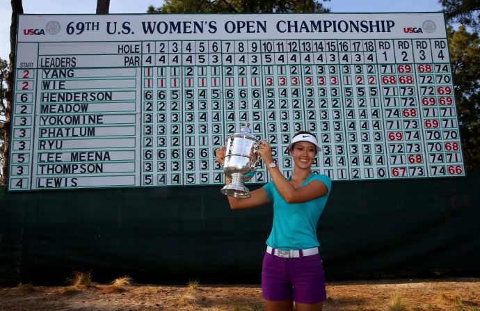 <strong>Major success:</strong> Wie celebrates with the trophy after winning the 69th US Women's Open in 2014.