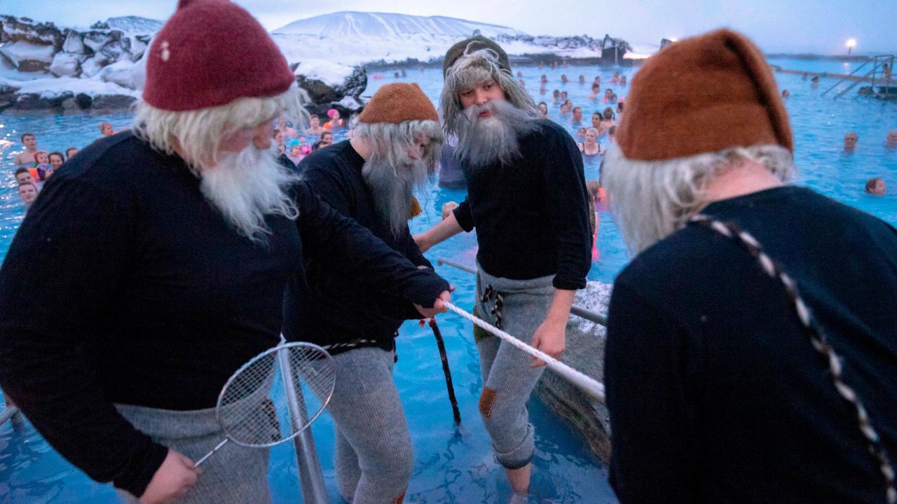 Local actors playing mischievous Yule Lads assemble at the geothermal lagoon by Iceland's Lake Myvatn, December 8, 2018.