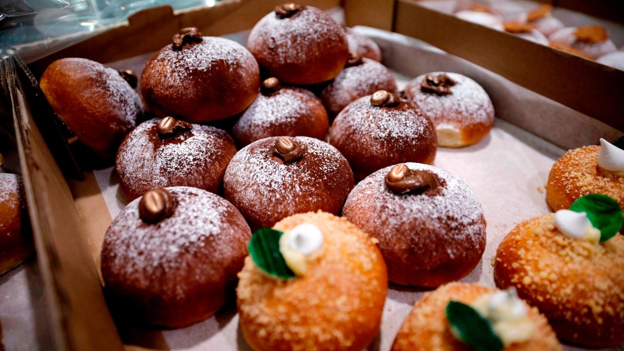 Hanukkah doughnuts filled with jam or vanilla cream are called "sufganiyot" in Hebrew. Here they're shown at a market in Jerusalem December 6, 2018.