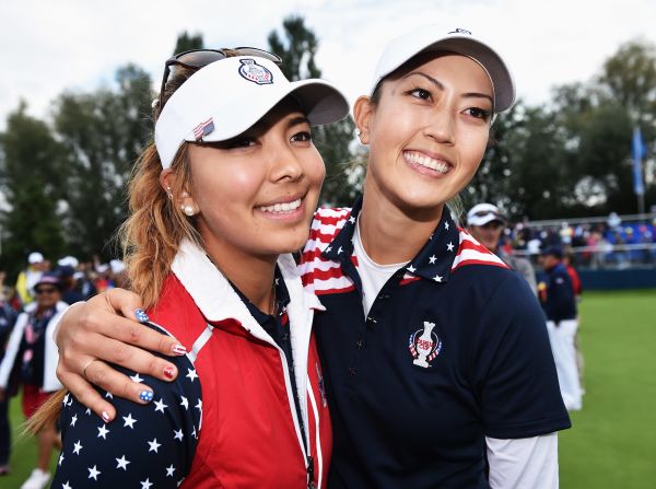 <strong>Team player: </strong>Wie and fellow Team US teammate Alison Lee celebrate after winning the singles matches of the Solheim Cup in 2015.