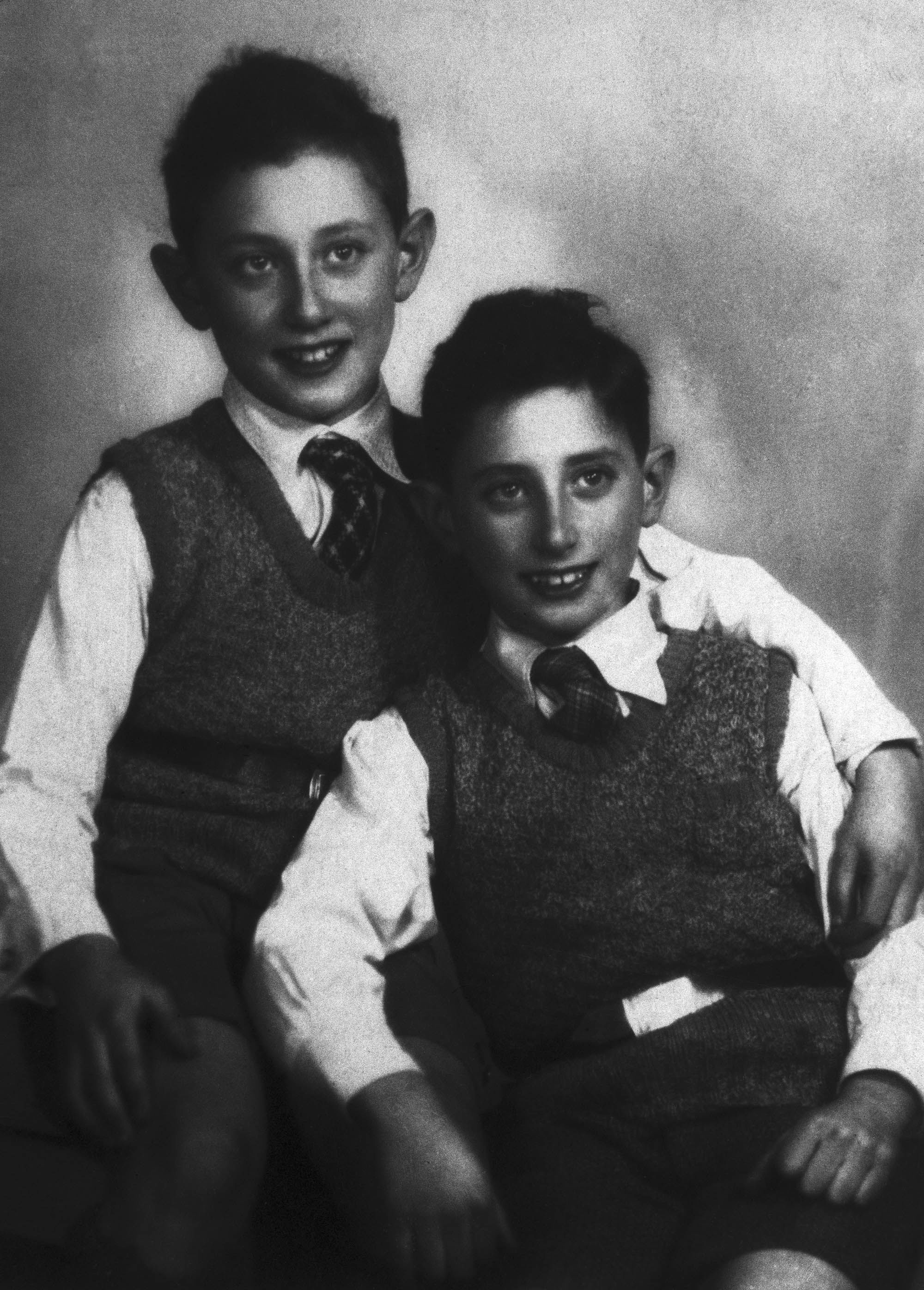 An 11-year-old Kissinger is seen with his younger brother, Walter, in the 1930s. Kissinger was born in Fürth, Germany, as Heinz Alfred Kissinger. His name was changed to Henry when his family fled Nazi Germany and settled in the United States.