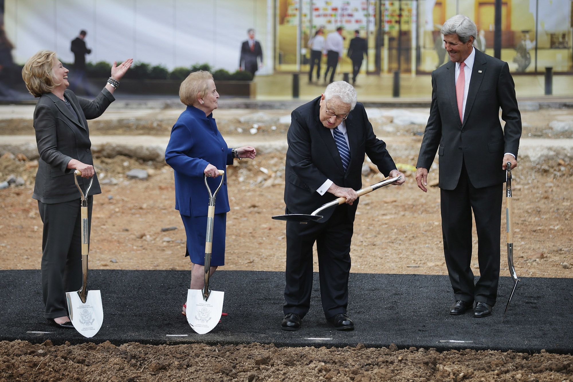 From left, former Secretaries of State Hillary Clinton, Madeleine Albright and Kissinger join Secretary of State John Kerry for the ceremonial groundbreaking of the US Diplomacy Center in 2014.
