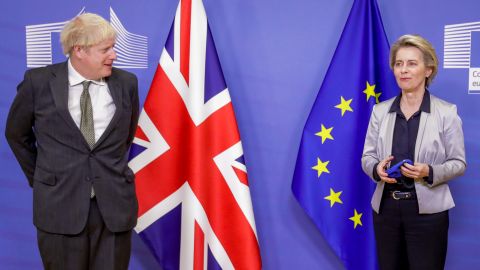 European Commission President Ursula von der Leyen, right, welcomes British Prime Minister Boris Johnson prior to a meeting at EU headquarters in Brussels, Wednesday, Dec. 9, 2020.