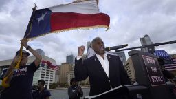 Texas GOP chairman Allen West, right, speaks to supporters of President Donald Trump during a rally in front of City Hall in Dallas, Saturday, Nov. 14, 2020. (AP Photo/LM Otero)