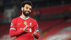 LIVERPOOL, ENGLAND - DECEMBER 01: Mohamed Salah of Liverpool reacts during the UEFA Champions League Group D stage match between Liverpool FC and Ajax Amsterdam at Anfield on December 01, 2020 in Liverpool, England. Sporting stadiums around the UK remain under strict restrictions due to the Coronavirus Pandemic as Government social distancing laws prohibit fans inside venues resulting in games being played behind closed doors. (Photo by Michael Regan/Getty Images)