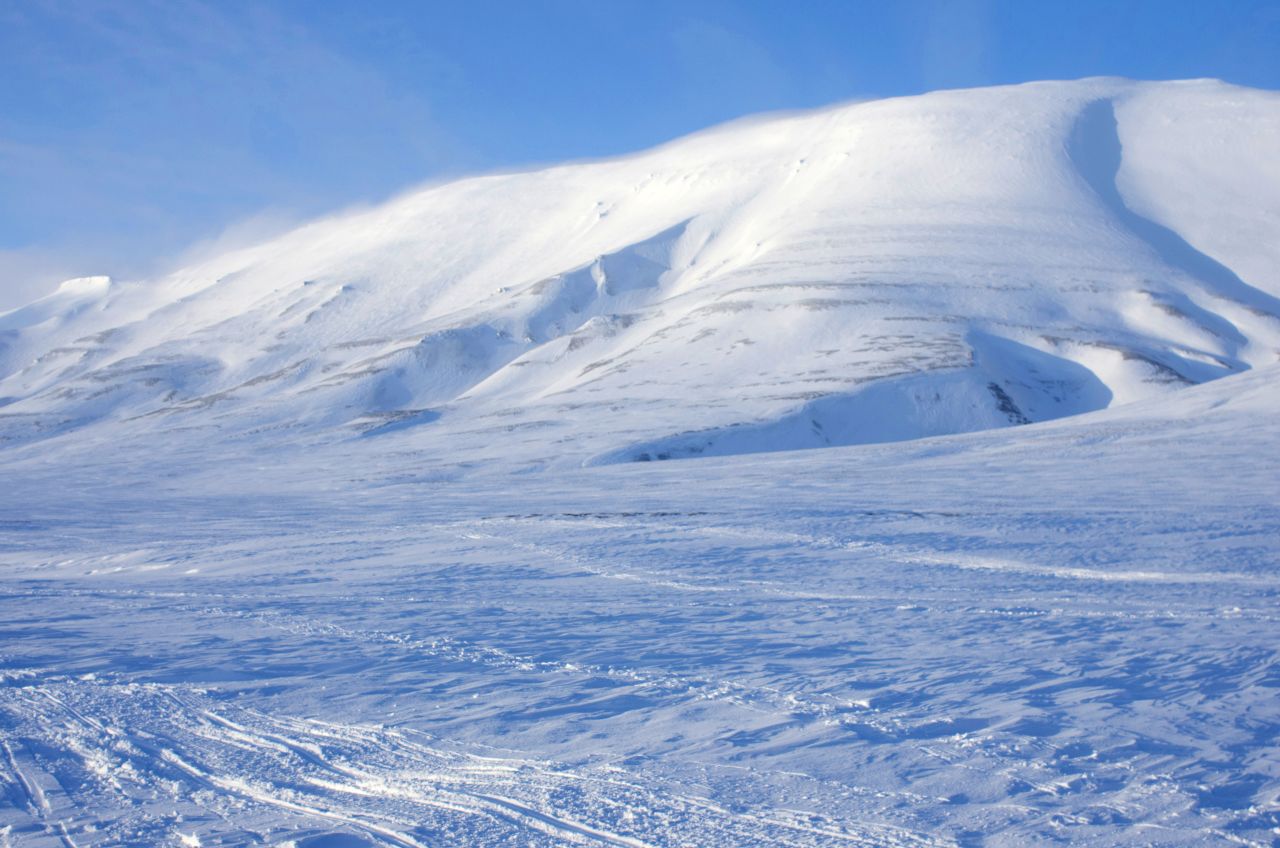 Snow cover on Svalbard in March 2019, before the start of the summer melt. Climate change has reduced snow cover in the Arctic, exposing more ice to sunlight and creating the perfect conditions for microbes to thrive.