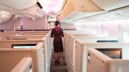 SHANGHAI, GUANGDONG, CHINA - 2019/10/03: Flight attendant walks in a business cabin of a Shanghai airlines Boeing 787-9 Dreamliner at the Shanghai Hongqiao International Airport. (Photo by Alex Tai/SOPA Images/LightRocket via Getty Images)