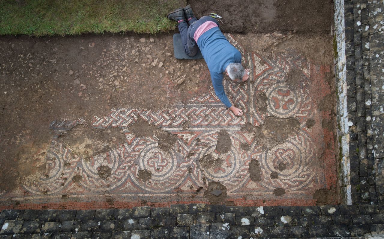 An archaeologist at Chedworth Roman Villa exploring what lies underneath parts of the villa, some of which haven't ever been explored.