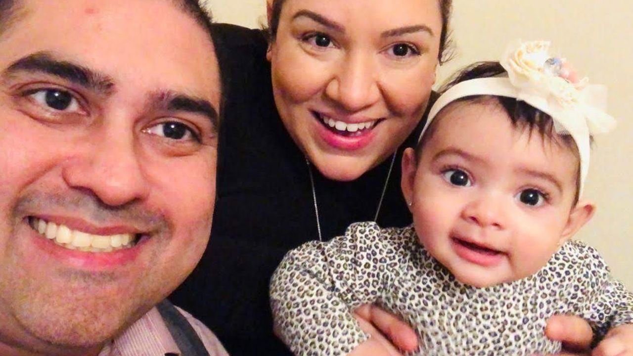 Dr. Hamza Ansari, pictured with wife Michelle and daughter Mia, said he was "excited" about the vaccine after almost dying from Covid-19 in March.