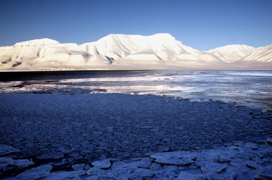 A calm fjord near Longyearbyen, Svalbard, in Arctic Norway, belies the changes that have been wrought on the region. The Arctic today is much hotter, greener and less icy than it was 15 years ago, <a href="https://edition.cnn.com/2020/12/08/weather/noaa-arctic-report-card-2020-climate-change/index.html" target="_blank">according to a recent report</a> by the National Oceanic and Atmospheric Administration (NOAA).