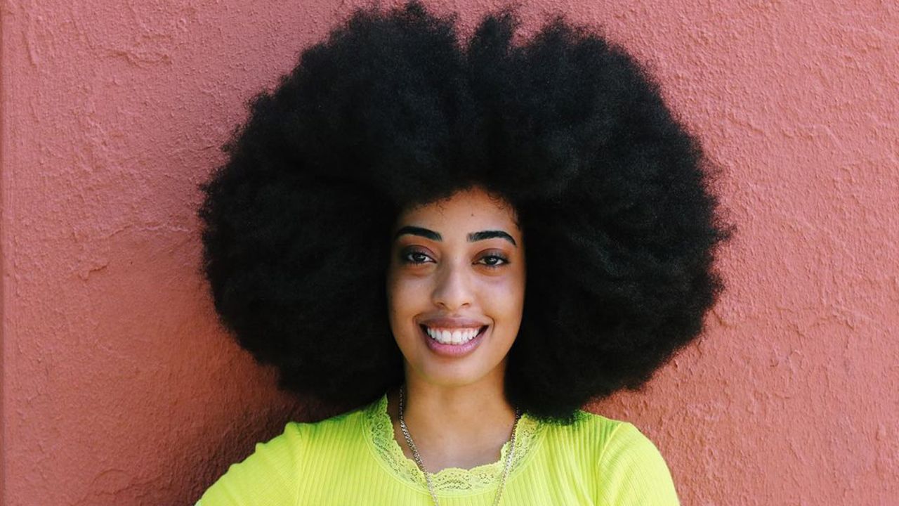Simone Williams's afro is 4 feet and 10 inches in circumference.

