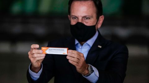 Sao Paulo Gov. Joao Doria holds a box of Sinovac's Coronavac vaccine during a news conference on November 19, 2020 in Sao Paulo, Brazil.