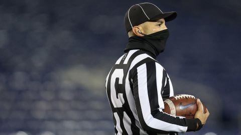 A college football referee wears a face covering due to Covid-19 pandemic during the second half at Navy-Marine Corps Memorial Stadium on November 28, 2020 in Annapolis, Maryland.