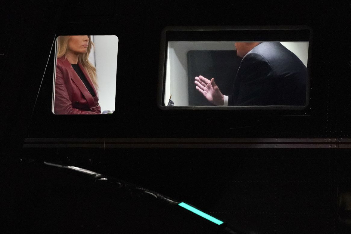 US President Donald Trump speaks with first lady Melania Trump aboard Marine One as it approached the White House on Saturday, December 5. The Trumps were returning from a rally in Georgia for Senate candidates David Perdue and Kelly Loeffler.