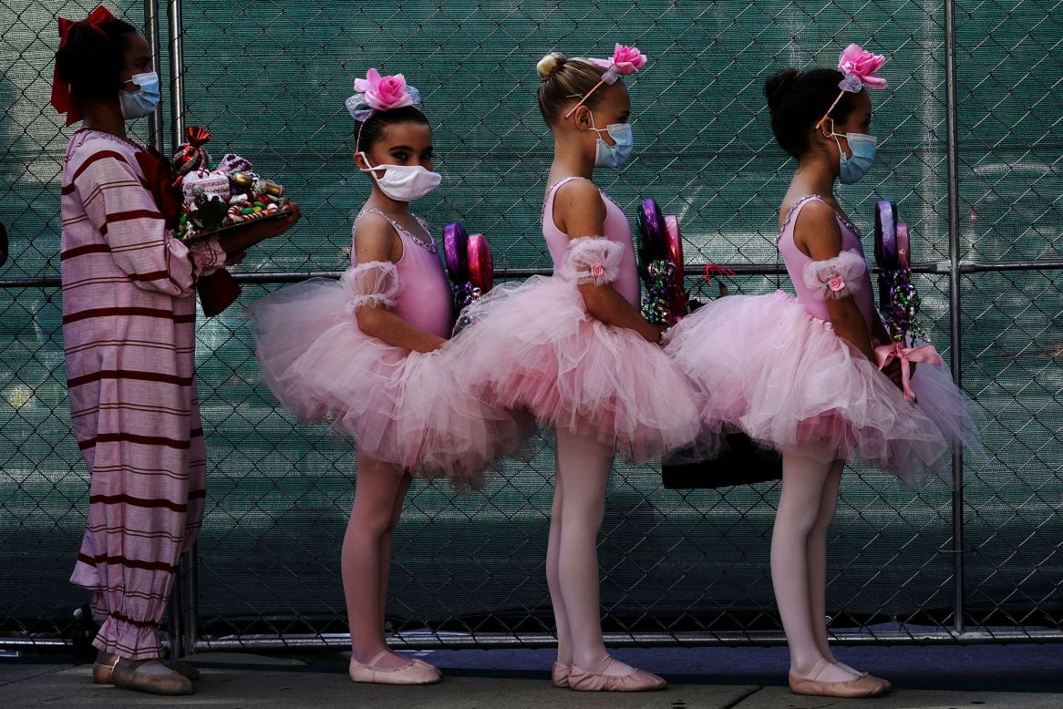 Students from the San Diego Ballet School wear protective masks backstage during a drive-in performance of "The Nutcracker" on Saturday, December 5.