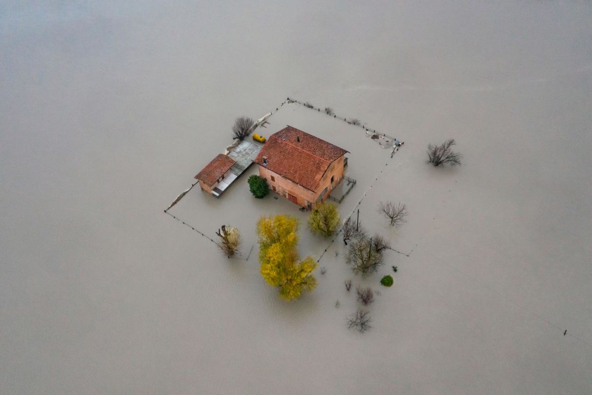 Buildings in Modena, Italy, are submerged by floodwaters from the Panaro River on Sunday, December 6. The flooding affected dozens of inhabited homes and some farms.