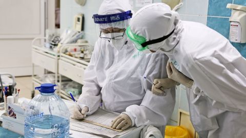 Medical staff at the infectious diseases department of Russia's Volgograd City Clinical Emergency Hospital No 15, which treats Covid-19 patients, on December 4.