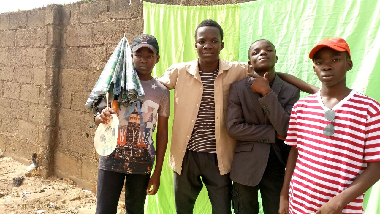 Members of The Critics posing on the set of one of their short films, "Chase," in Kaduna, Nigeria.