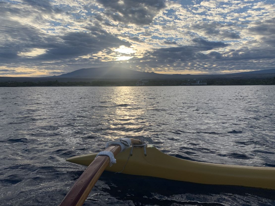 Watch the sunrise over Mauna Kea from an outrigger canoe.