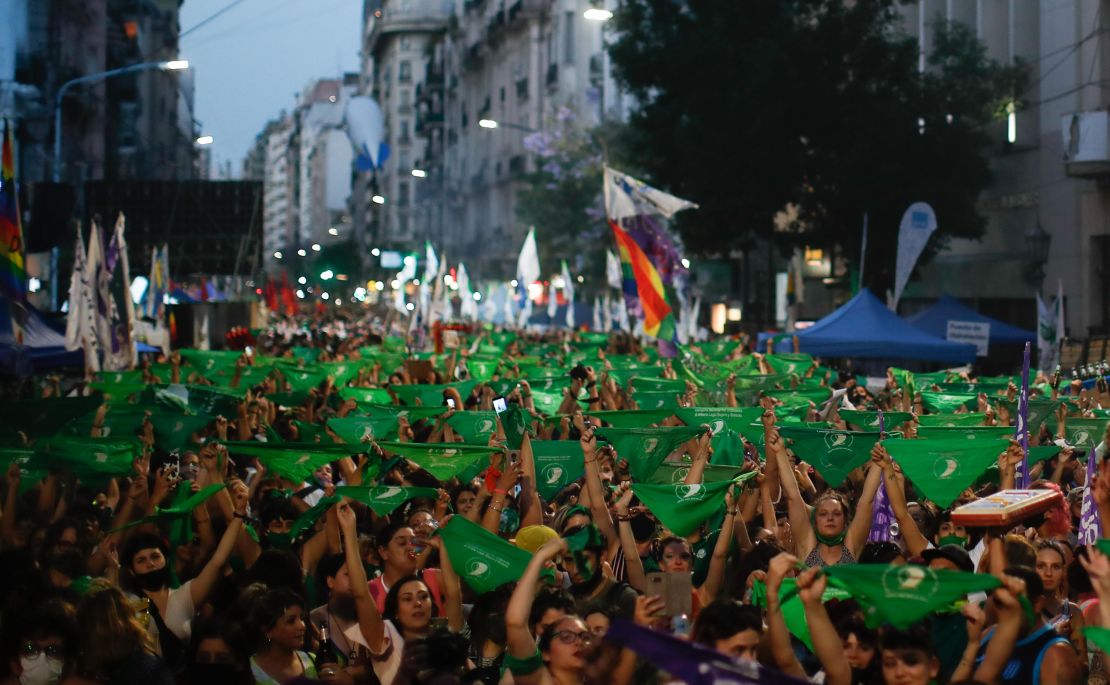 Abortion-rights supporters rally Thursday outside Argentina's Congress with green handkerchiefs associated with the movement to decriminalize abortion.