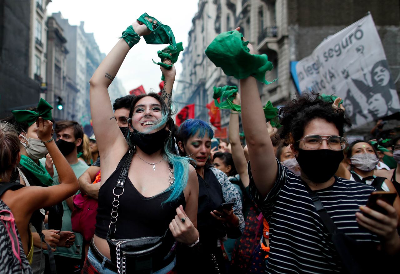 Abortion-rights activists celebrate in Buenos Aires on Friday, December 11, after Argentina's lower house of Congress <a href="https://www.cnn.com/2020/12/11/americas/argentina-abortion-bill-congress-intl/index.html" target="_blank">approved a bill that would legalize abortion.</a> The bill now moves to the Senate. 
