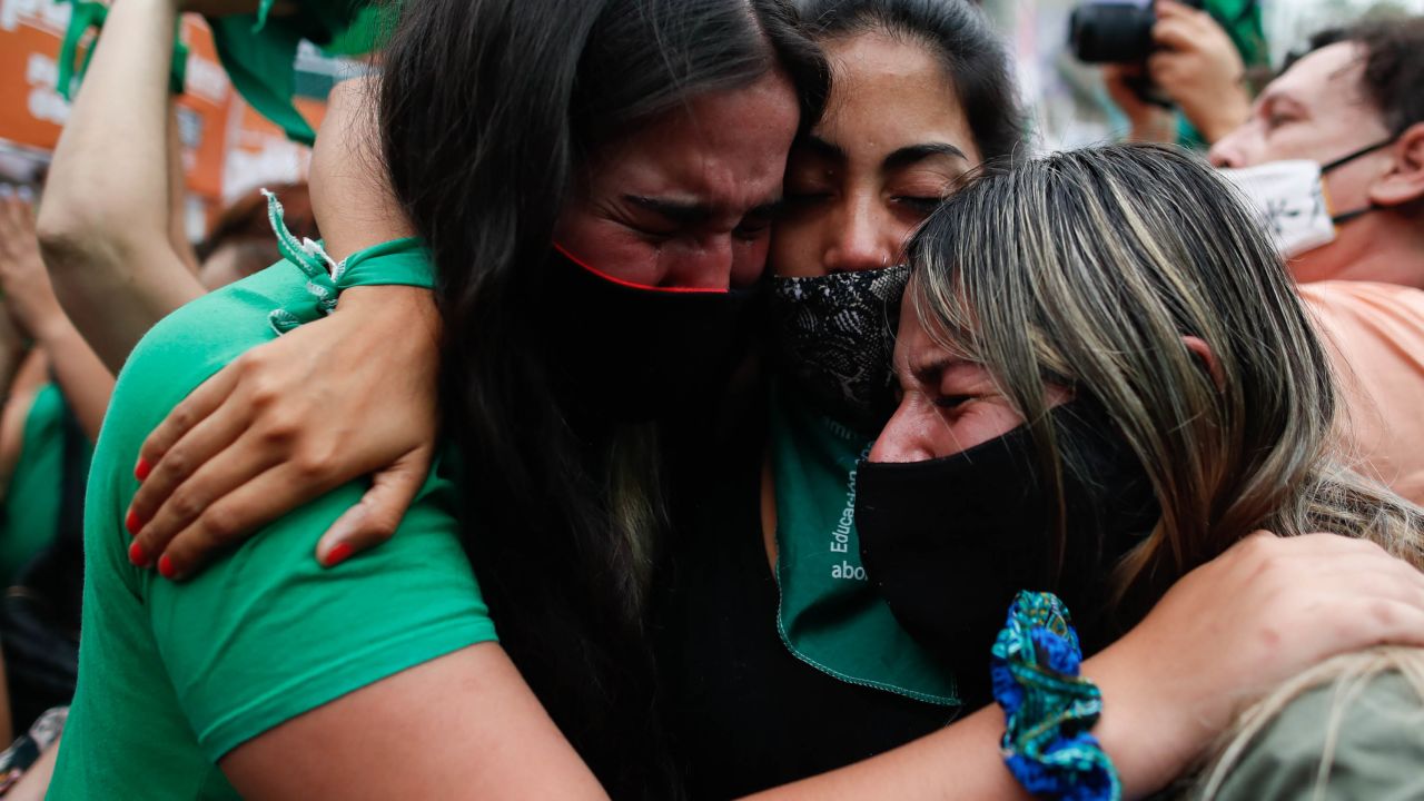 Abortion-rights supporters react in Buenos Aires as Argentina's lower house approves a bill that would legalize abortion.