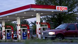 A vehicle passes an Exxon Mobil Corp. gas station in Falls Church, Virginia, U.S., on Tuesday, April 28, 2020. Exxon is scheduled to released earnings figures on May 1. Photographer: Andrew Harrer/Bloomberg via Getty Images