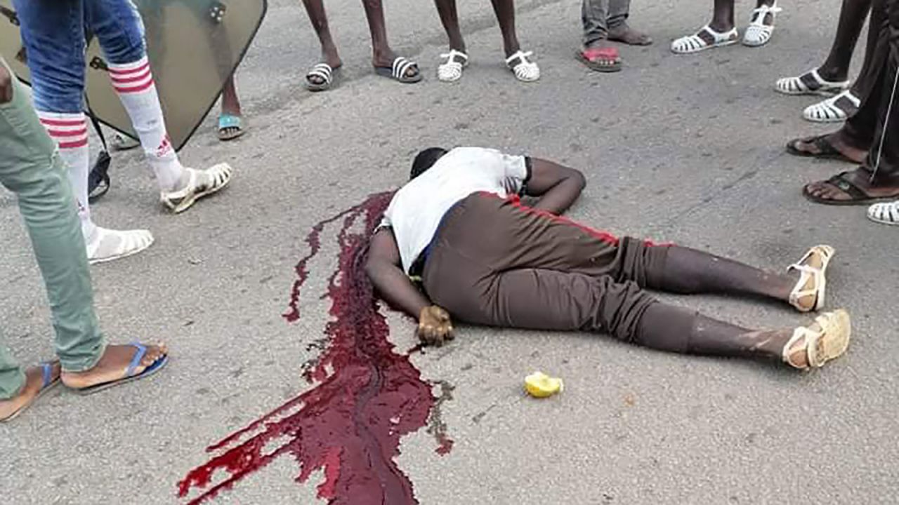 In this photo obtained by CNN from Human Rights Watch (HRW), a person is seen on the ground following a protest in Ellibou, Ivory Coast, on November 9. Witnesses told HRW that three people were killed by Ivorian security forces who opened fire after a group of demonstrators walked onto the road to block traffic to protest the re-election of Ivorian President Alassane Ouattara.