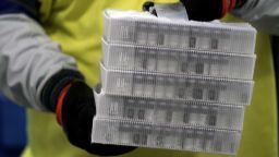 Vials in boxes containing the Pfizer-BioNTech Covid-19 vaccine are prepared to be shipped at the Pfizer Global Supply Kalamazoo manufacturing plant in Kalamazoo, Michigan on December 13, 2020. 