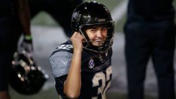 Vanderbilt Commodores place kicker Sarah Fuller (32) smiles to cheers for her in the stands after successfully kicking her second point after attempt during a game between the Vanderbilt Commodores and Tennessee Volunteers in which she became the first female to score a point for a power five conference school, December 12, 2020 at Vanderbilt Stadium in Nashville, Tennessee.