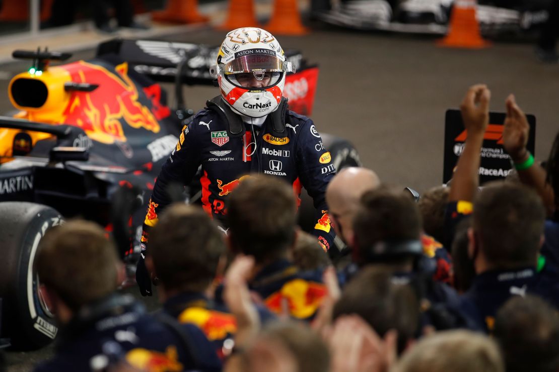 Red Bull's Max Verstappen celebrates with the team after winning the Abu Dhabi GP. 