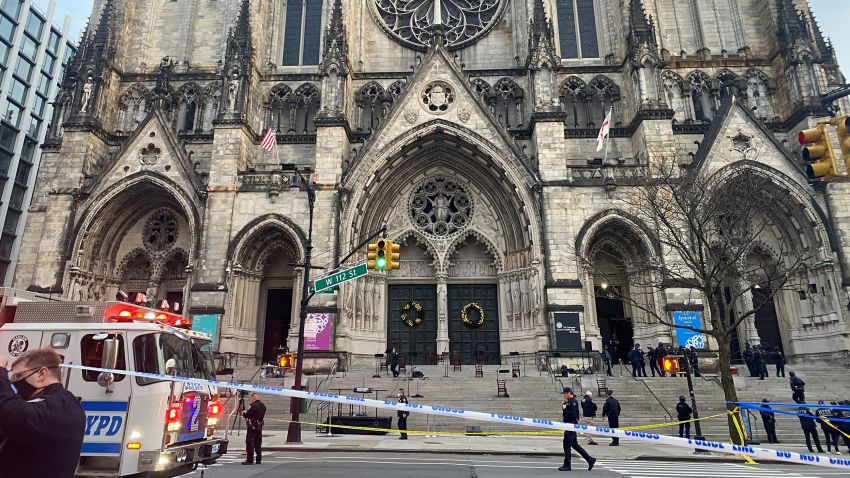 Police are seen outside of the Cathedral of St. John the Divine in New York on December 13, 2020, after a shooter opened fire outside the church before police returned fire and took the man into custody. (Photo by Eleonore SENS / AFP) (Photo by ELEONORE SENS/AFP via Getty Images)