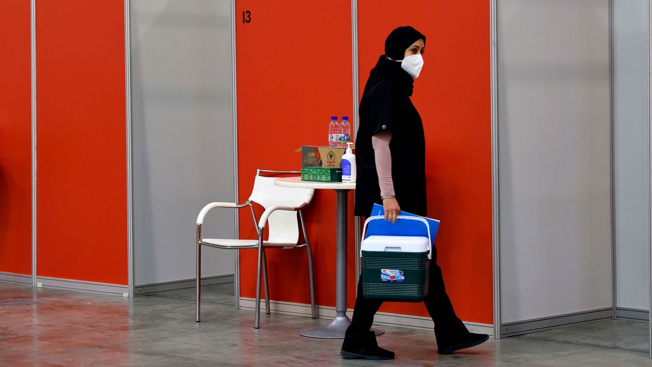 A worker in the Bahraini capital Manama's convention centre, which was repurposed for Sinopharm vaccine trials, on August 27.