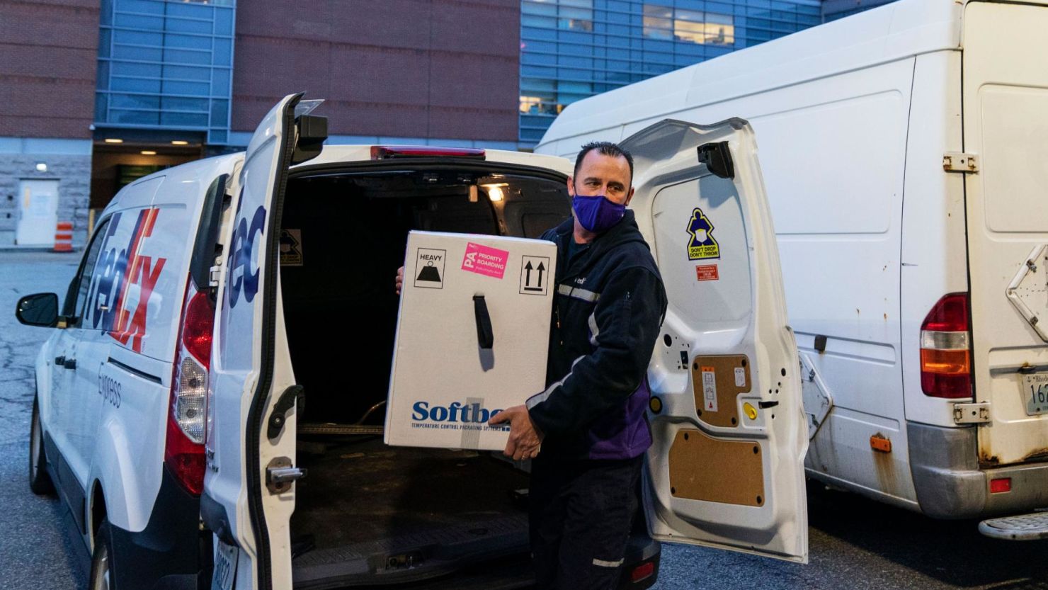 A FedEx driver delivers Pfizer's Covid-19 vaccine to Rhode Island Hospital in Providence.
