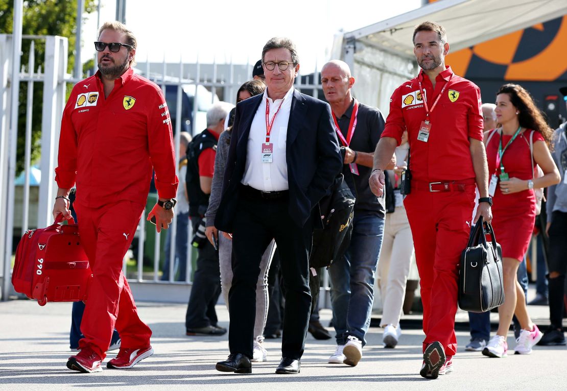 Louis Camilleri's (center) surprise resignation as CEO of Ferrari has cast doubt over Binotto's position as team principal.
