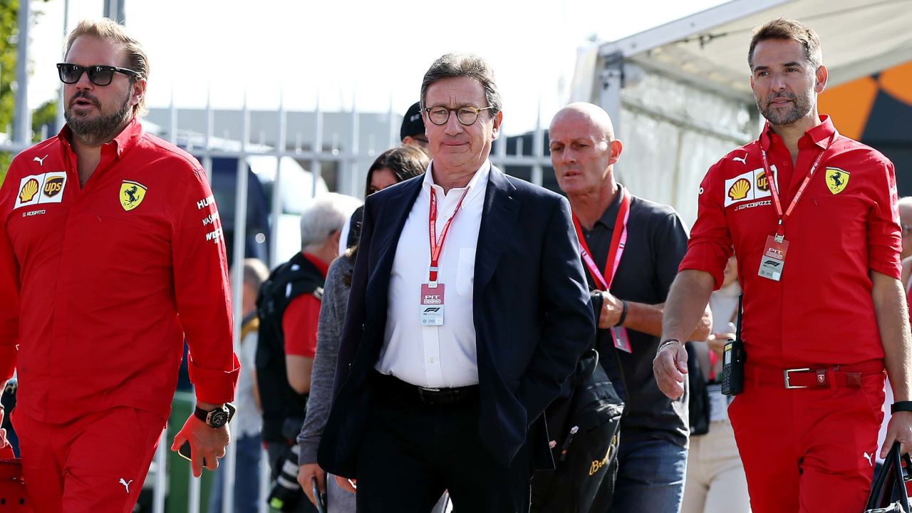 Louis Camilleri's (center) surprise resignation as CEO of Ferrari has cast doubt over Binotto's position as team principal.