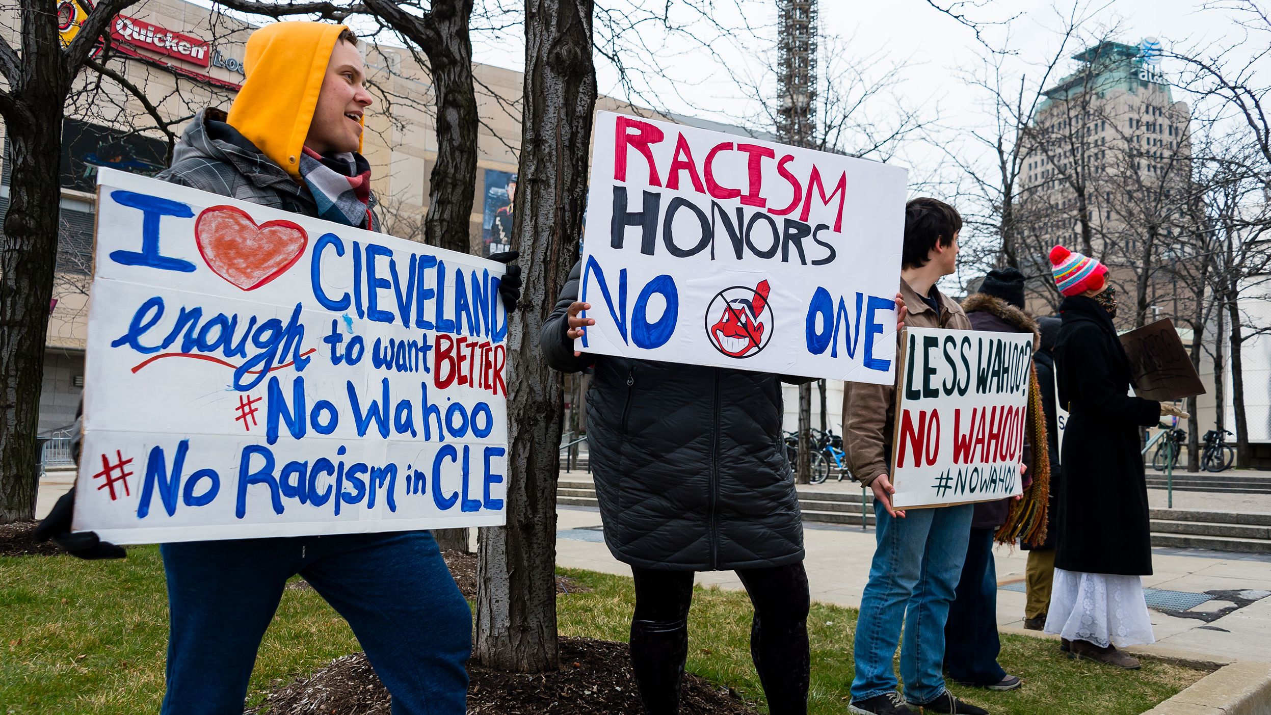 Protesters express their disapproval of the Cleveland Indians Chief Wahoo logo before the game against the Kansas City Royals outside Progressive Field on April 6, 2018, in Cleveland.