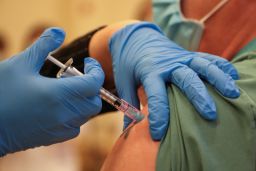 A personal support worker receives the vaccine in Toronto.