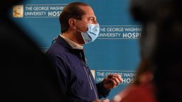 US Secretary of Health and Human Services Alex Azar speaks to the press after attending the first injections of the coronavirus vaccine at the George Washington University Hospital in Washington, DC, on December 14, 2020.