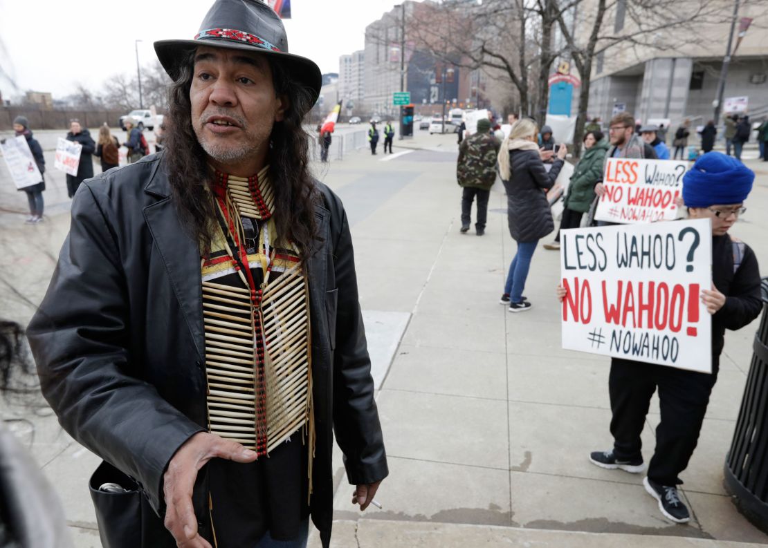 Philip Yenyo, executive director of the American Indian movement in Ohio, participates in a protest of Chief Wahoo before a home opener baseball game between the Kansas City Royals and the Cleveland Indians, Friday, April 6, 2018, in Cleveland.