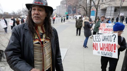 Philip Yenyo, executive director of the American Indian movement in Ohio, participates in a protest of Chief Wahoo before a home opener baseball game between the Kansas City Royals and the Cleveland Indians, Friday, April 6, 2018, in Cleveland.