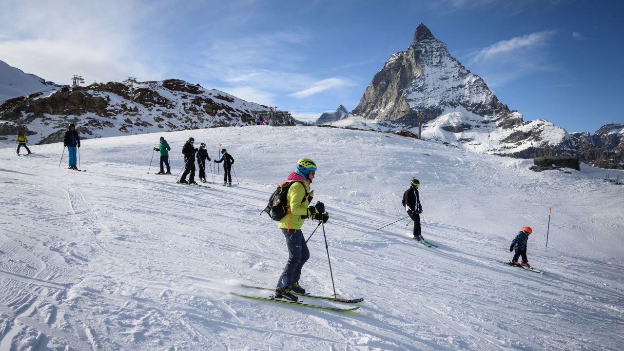 Skiers hit the slopes in the Swiss Alps on November 28.