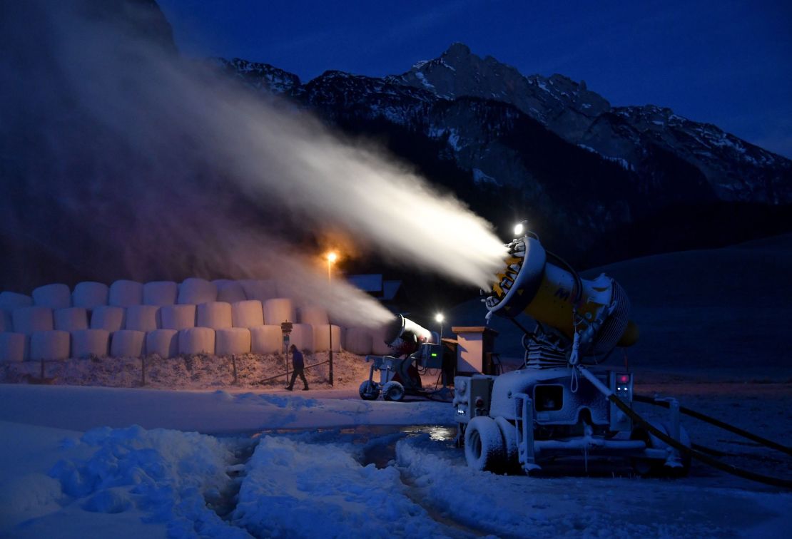 Snow cannons blow snow on the hills in the Abtenau ski resort on December 1.