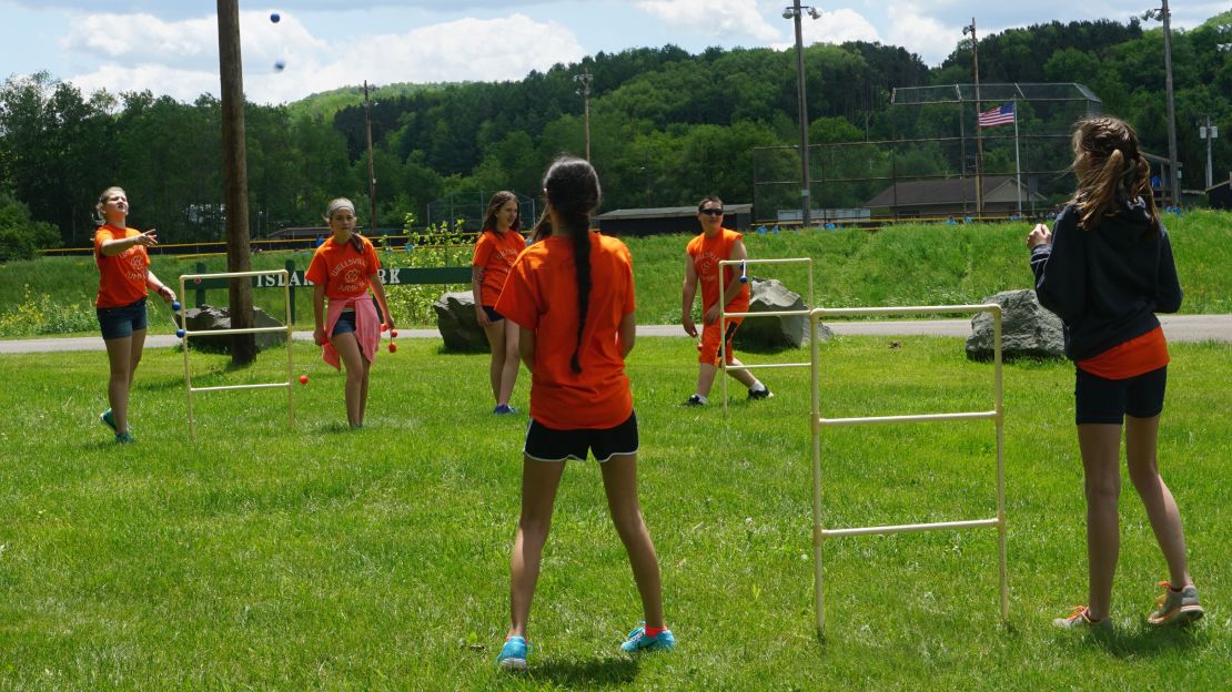 Seventh graders play ladder golf in Wellsville, New York. 