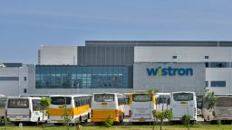 Buses stand in front of the Wistron-run iPhone factory outside Bangalore on December 13.