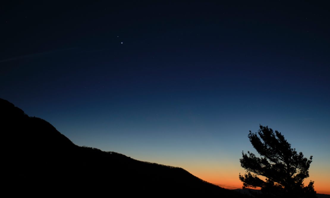 Saturn, top, and Jupiter, below, are seen after sunset on December 13 from Shenandoah National Park  in Luray, Virginia. 
