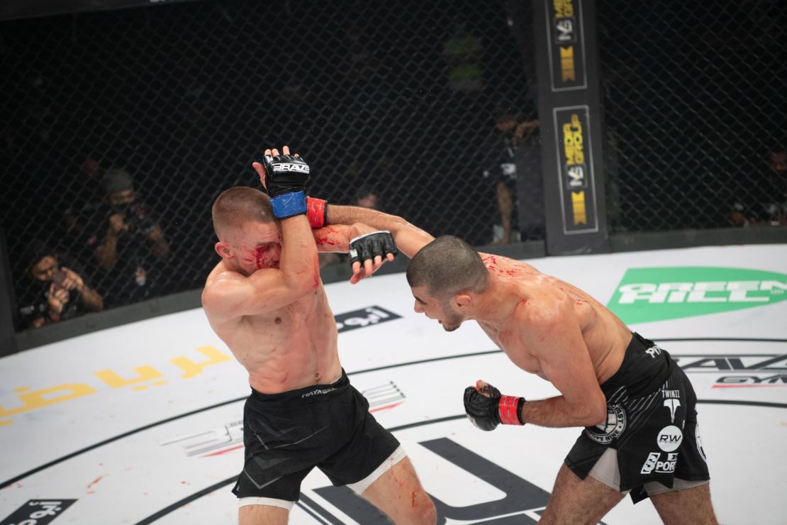 Mokaev (right) punches Jamie Kelly during Brave CF 43 in Bahrain.
