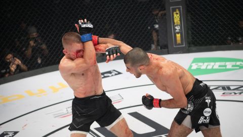 Mokaev (right) punches Jamie Kelly during Brave CF 43 in Bahrain.