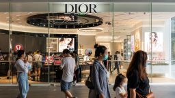 SHENZHEN, CHINA - 2020/10/04: Pedestrians walk past a French luxury goods company Christian Dior store in Shenzhen. (Photo by Alex Tai/SOPA Images/LightRocket via Getty Images)