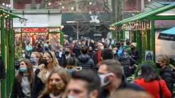 NEW YORK, NEW YORK - DECEMBER 12: People visit the holiday market at Bank of America Winter Village in Bryant Park as the city continues the re-opening efforts following restrictions imposed to slow the spread of coronavirus on December 12, 2020 in New York City. The pandemic has caused long-term repercussions throughout the tourism and entertainment industries, including temporary and permanent closures of historic and iconic venues, costing the city and businesses billions in revenue. (Photo by Noam Galai/Getty Images)